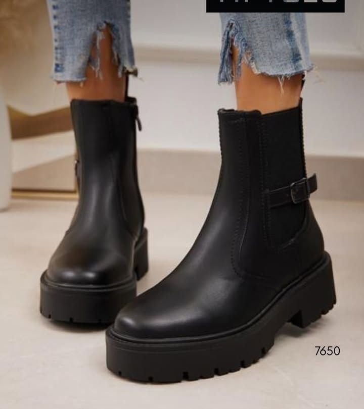 Girls Boots size 25-36 Leather-look Ladies boots with a black lug sole, side buckle detail, and a pull tab