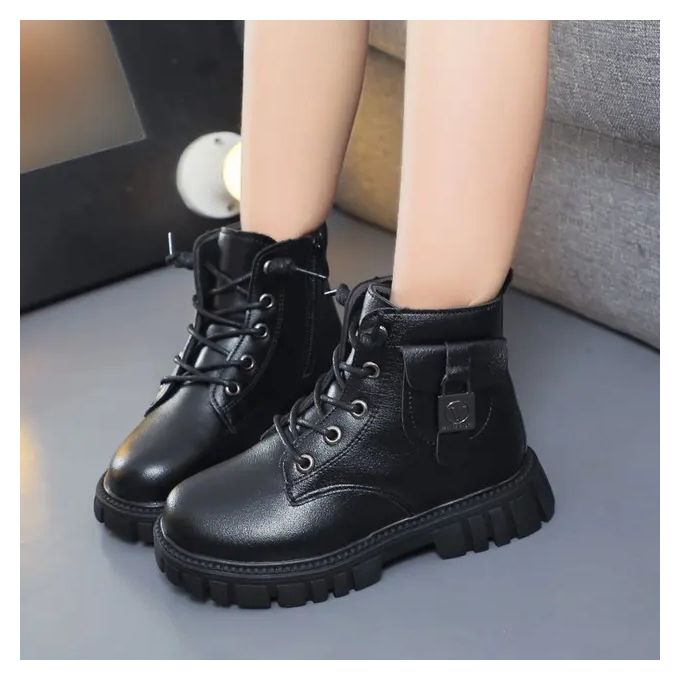 Kids Fashion boots size 25-30 pair of ankle boots with a chunky sole and a decorative side pocket detail.