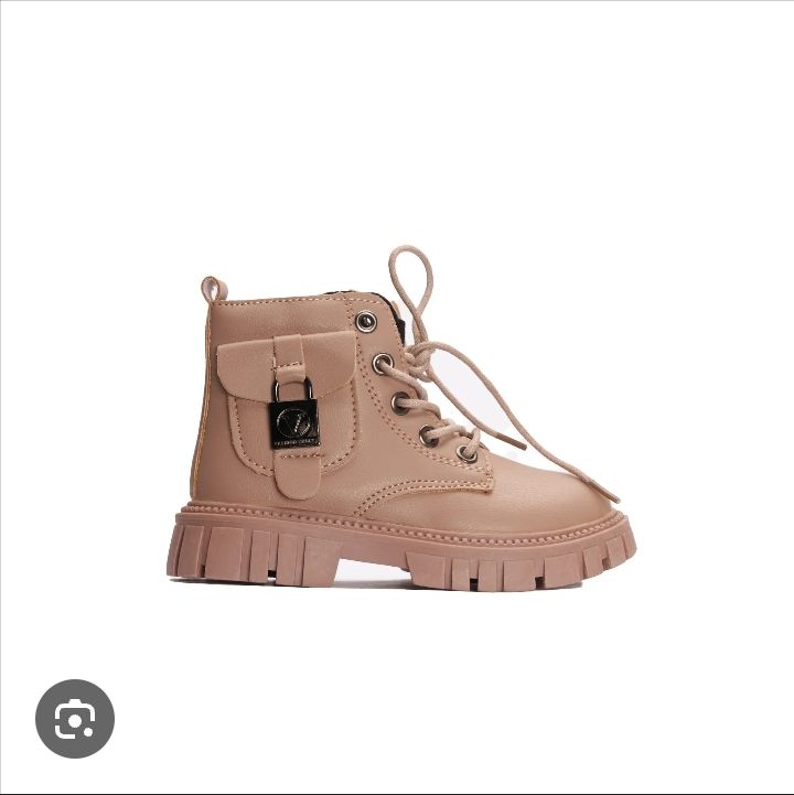 Kids Fashion boots size 25-30 pair of ankle boots with a chunky sole and a decorative side pocket detail.