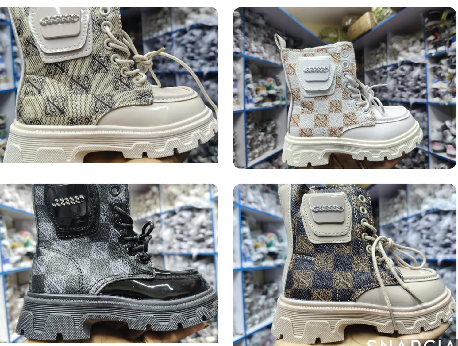 Golden boots girls size 25-30 kids' combat boots with a lace-up front and a stylish side pouch.