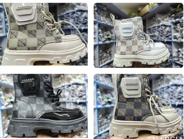 Golden boots girls size 25-30 kids' combat boots with a lace-up front and a stylish side pouch.