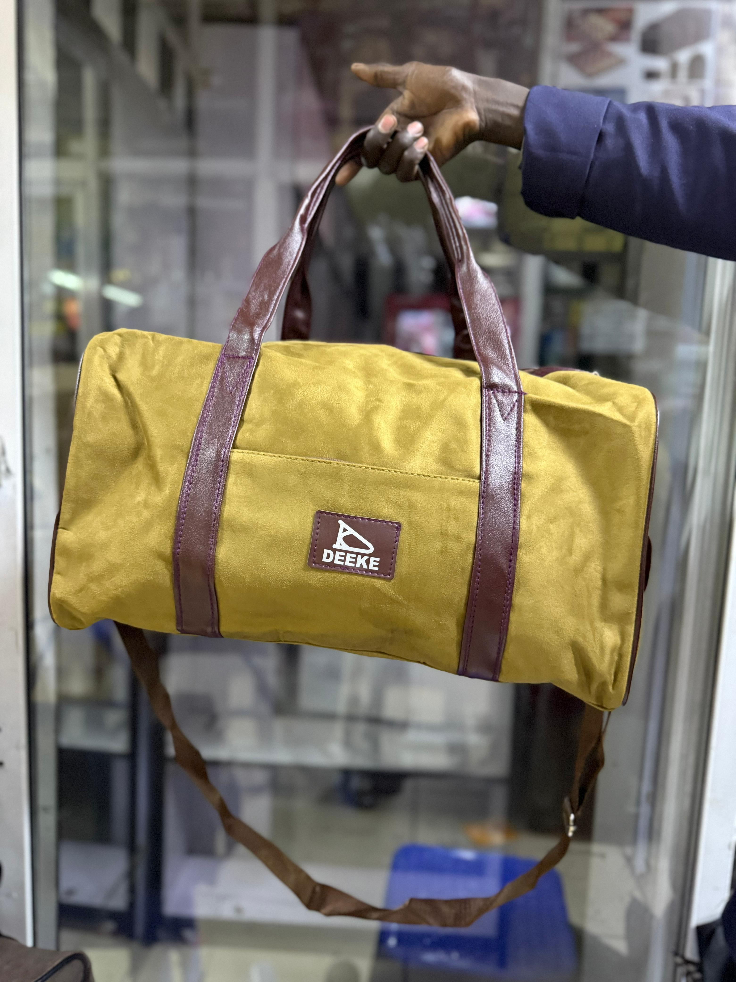 Trendy DEEKE Travel Duffel Bag ✨
	•	Material: Durable canvas with faux leather straps
	•	Size: Medium (Approx. 45cm x 25cm x 25cm)
	•	Perfect for: Travel, gym, or weekend getaways