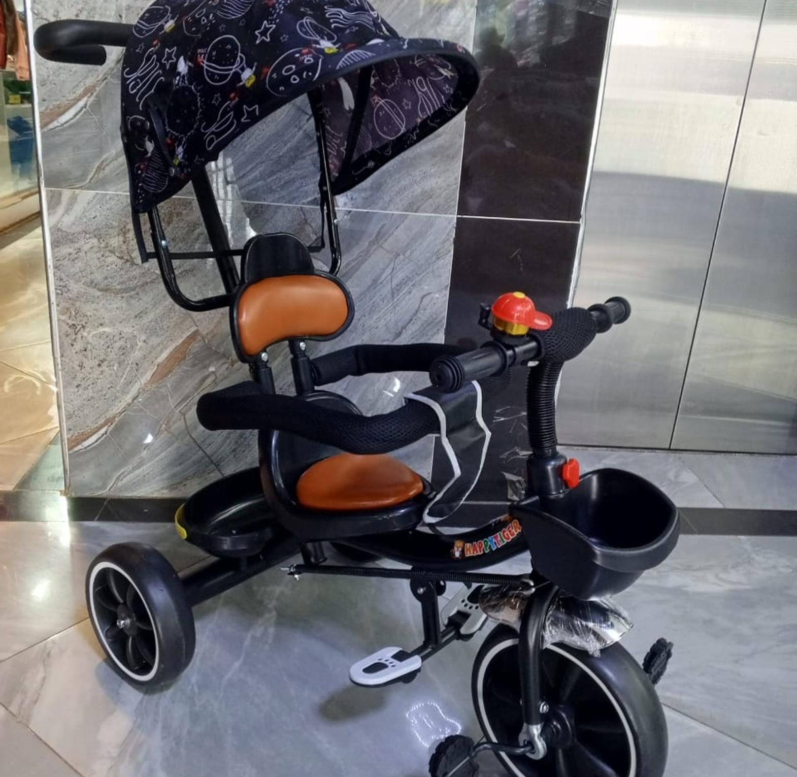 Affordable Baby tricycle with canopy for sale in KILIMALL....kenya🥳🥳 feature a protective canopy that shields little ones from sun and light rain, ensuring a comfortable outdoor experience. Typicall