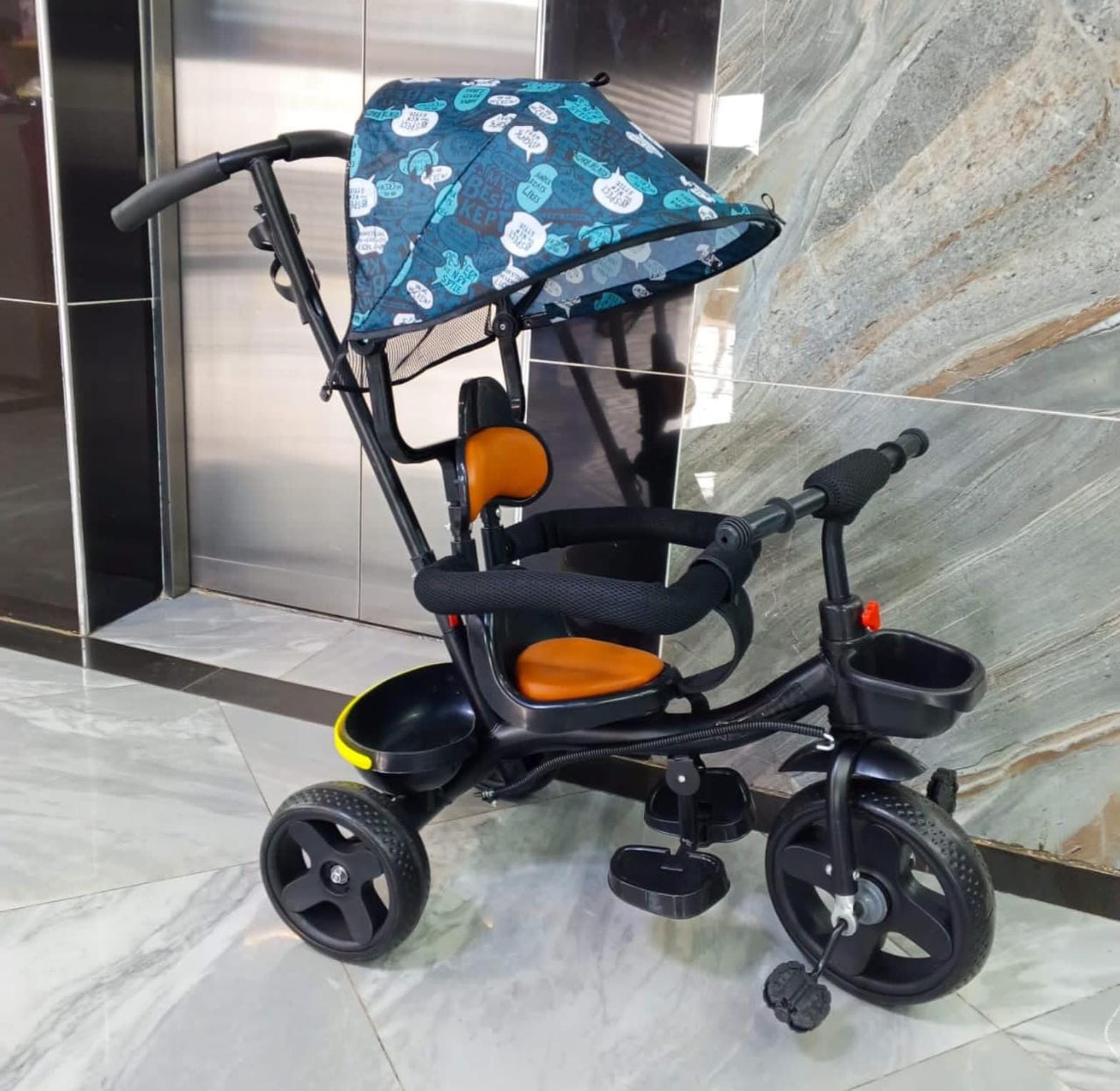 Affordable Baby tricycle with canopy for sale in KILIMALL....kenya🥳🥳 feature a protective canopy that shields little ones from sun and light rain, ensuring a comfortable outdoor experience. Typicall