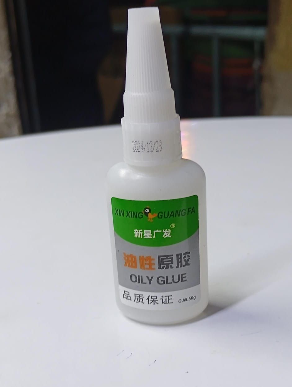Magic metal welding oily glue 50ml universal oily glue . Can stick metal,ceramic,wood,plastic