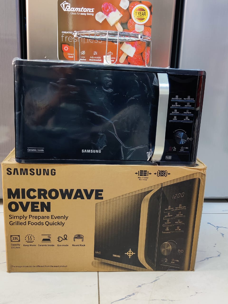 Samsung Microwave 23L with Grill and Ceramic inside    6 Power Levels
800 Watts Output Clock Display
Sound Option
Colour: Black