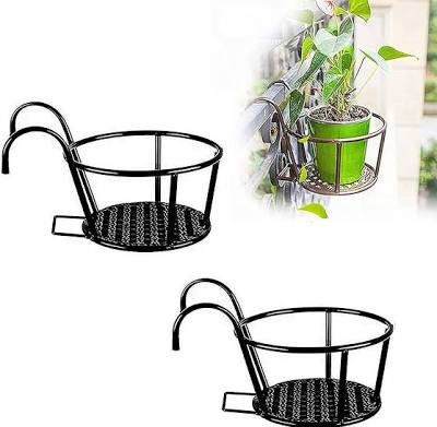 Metallic over the balcony flower pot holder,designed to maximize gardening space in apartments or homes with limited outdoor areas