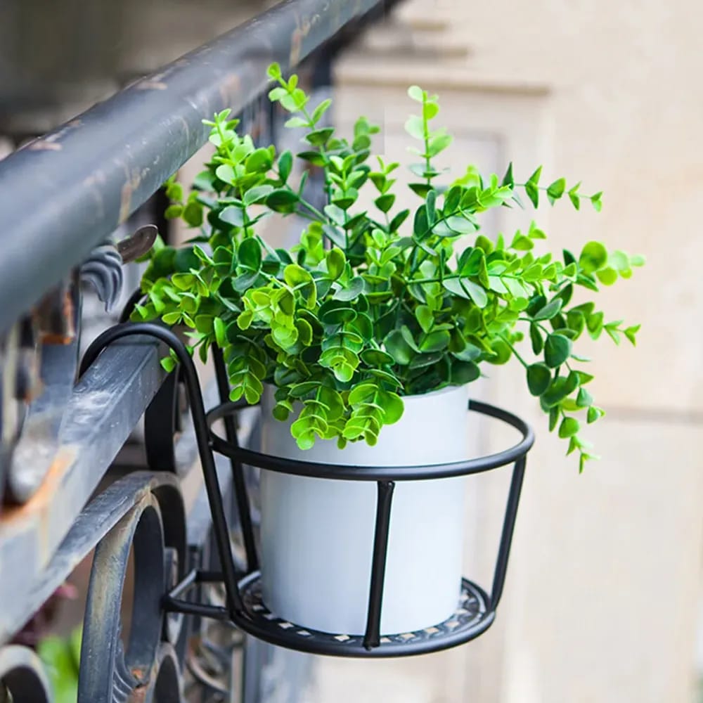 Metallic over the balcony flower pot holder,designed to maximize gardening space in apartments or homes with limited outdoor areas