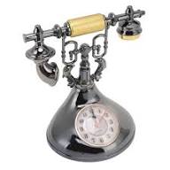 Retro telephone alarm clock decorative table ornaments designed to resemble classic rotary dial telephones.