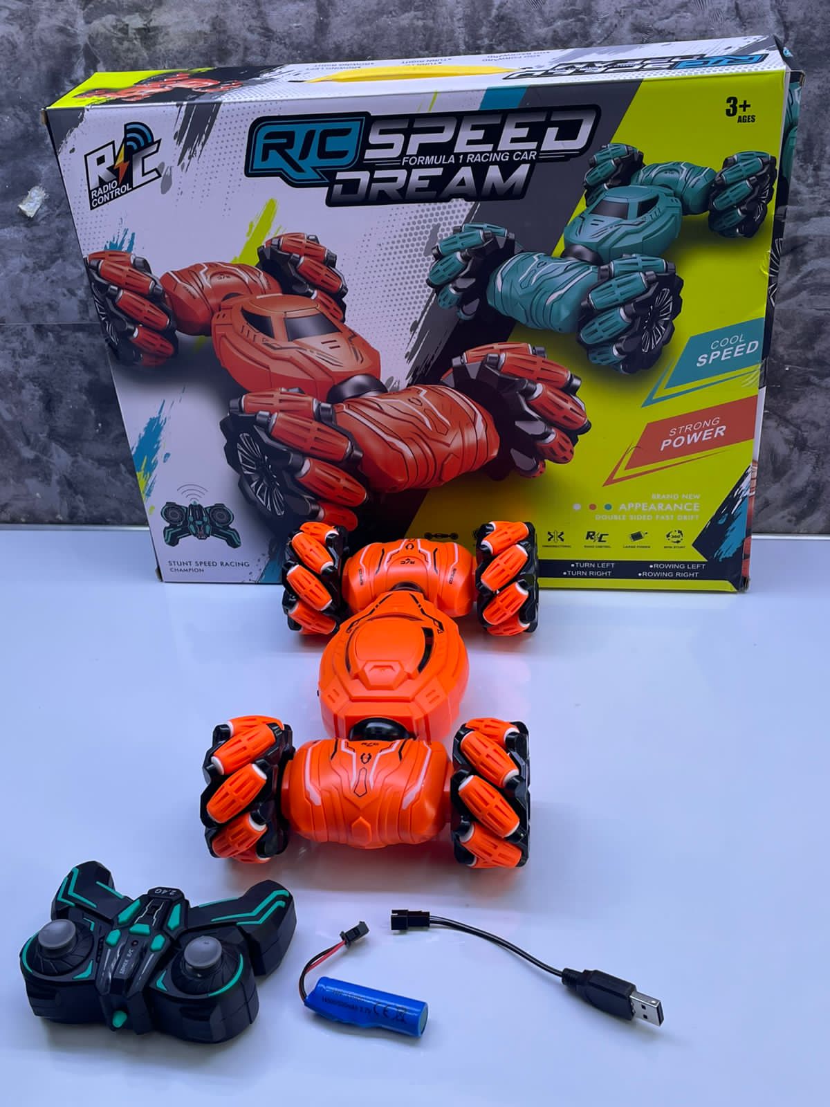 ‼️ AMAZING DISCOUNTS DEALS🌼‼️Rechargeable Remote Controlled Stunt car. It's power is Rechargeablewith a high Speed Racing.Moves forward and backward spin Stunt 360