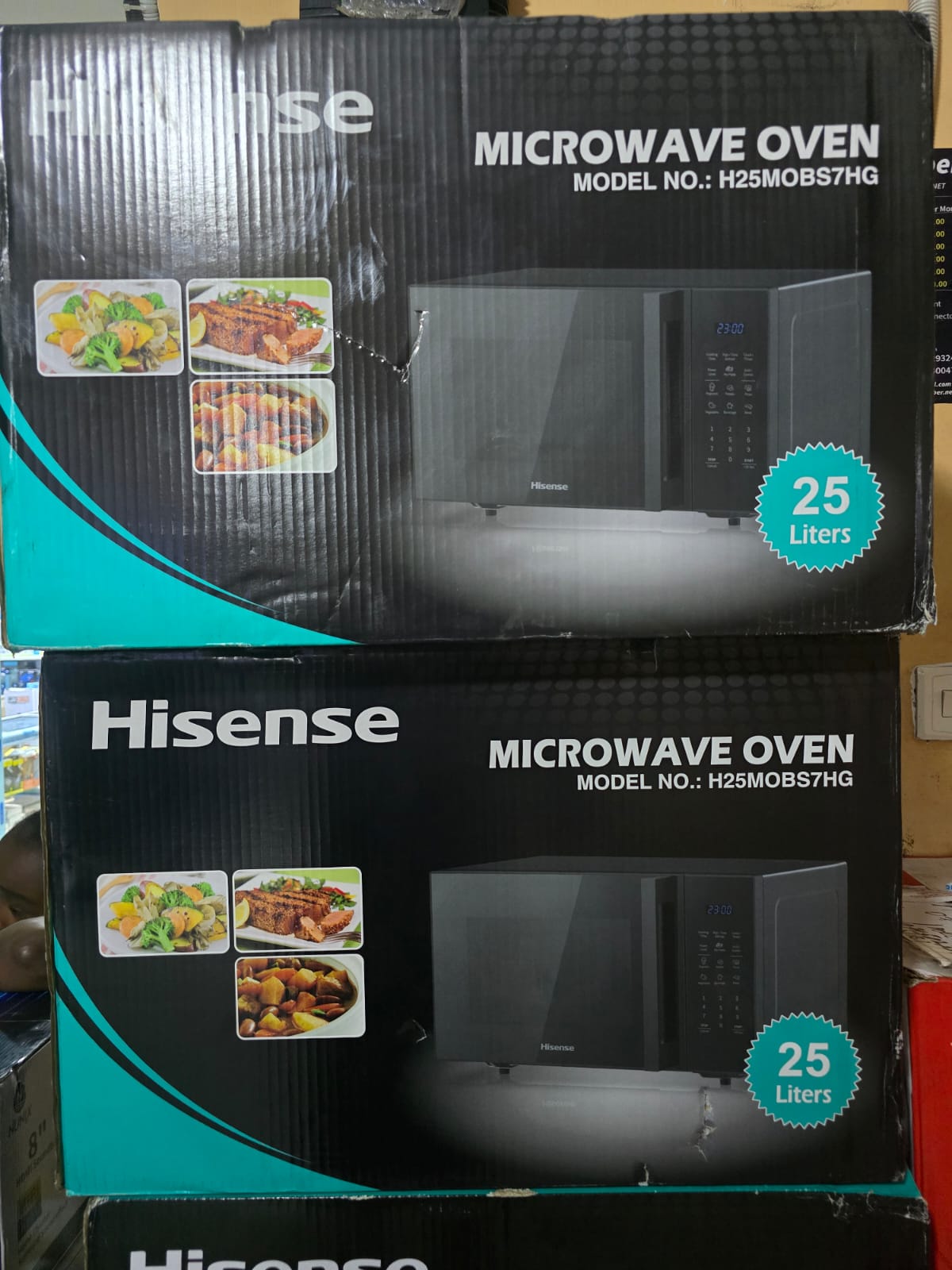 Hisense H25MOBS7HG Microwave Oven.
Capacity: 25 liters 
Power: 900W microwave, 1000W grill 
Features: Digital control panel with blue LED display, 11 microwave power levels, time/weight defrost functi