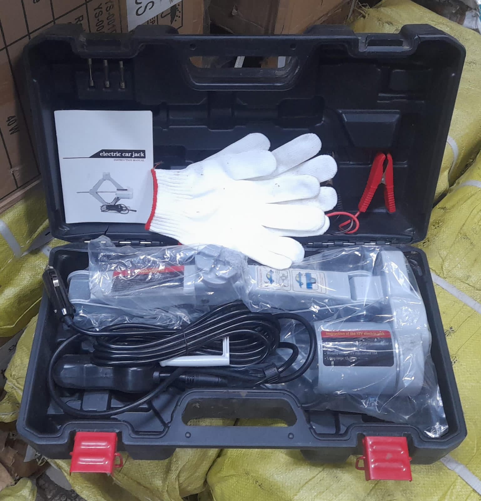 electric car jack kit. This type of kit is designed for easy and quick lifting of a vehicle for tire changes or other maintenance. 
It typically works with a 12V vehicle power outlet, such as a car's