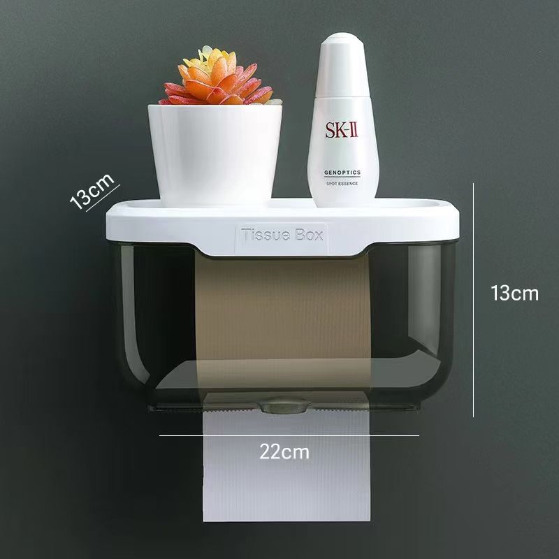wall-mounted, waterproof tissue box holder.
It is designed for use in bathrooms, kitchens, or offices to save counter space. 
The holder is waterproof and moisture-proof, making it suitable for humid