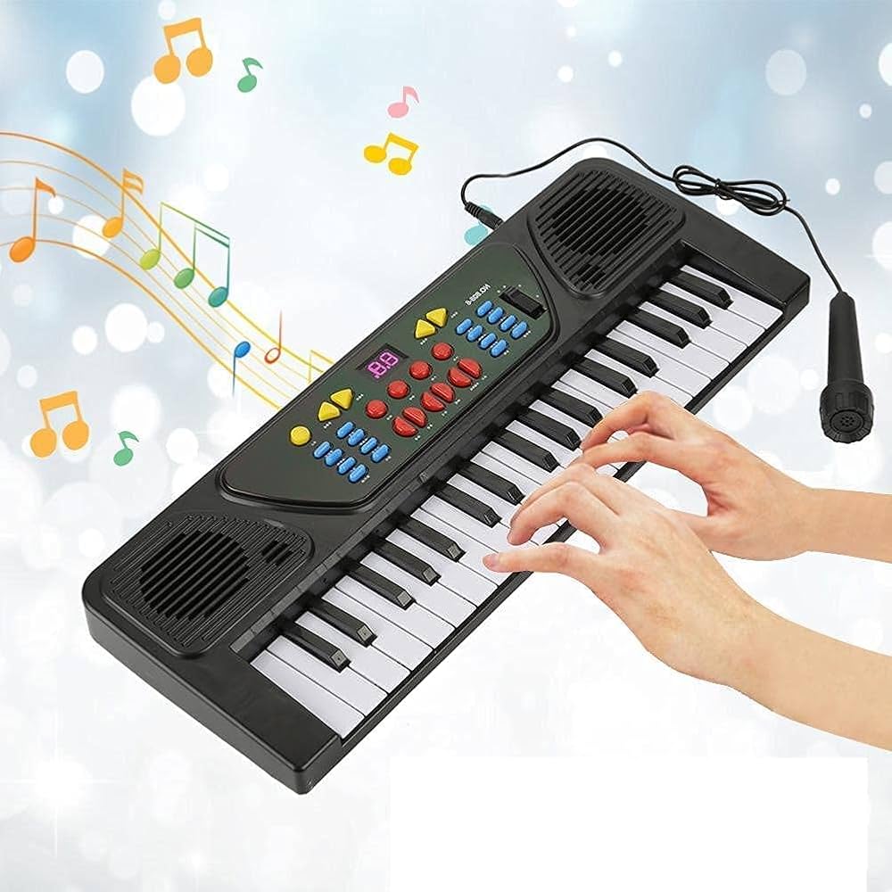 Electronic Keyboard Piano with Charging Cable & Microphone – Rechargeable Digital Keyboard for Kids & Beginners. A versatile and user-friendly digital piano designed for kids, beginners, and music.