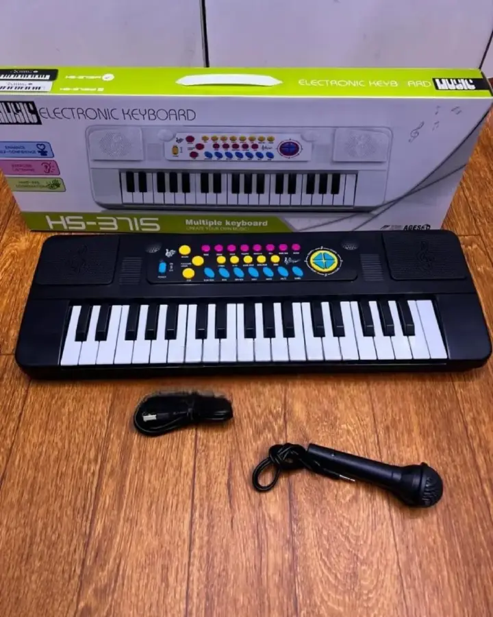 Electronic Keyboard Piano with Charging Cable & Microphone – Rechargeable Digital Keyboard for Kids & Beginners. A versatile and user-friendly digital piano designed for kids, beginners, and music.