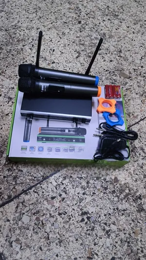 BNK Wireless Microphone System DH_744 – 2-Channel Professional UHF Wireless Mic with Auto Mute & Power Saving. A professional-grade wireless audio solution ideal for karaoke, events, conferences.