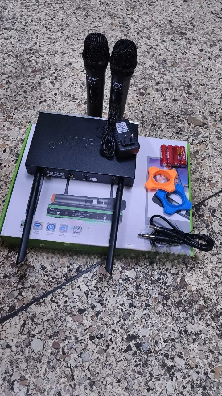 BNK Wireless Microphone System DH_744 – 2-Channel Professional UHF Wireless Mic with Auto Mute & Power Saving. A professional-grade wireless audio solution ideal for karaoke, events, conferences.