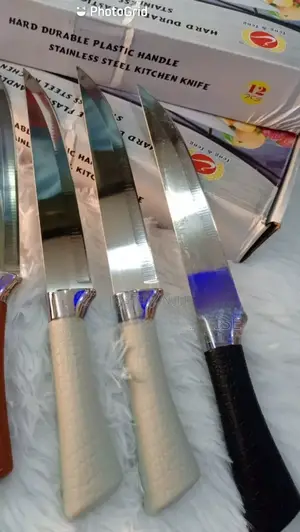 Stainless Steel Kitchen Knife – Sharp, Durable & Ergonomic Chef Knife for Home & Professional Use. An essential kitchen tool for home cooks and professional chefs.