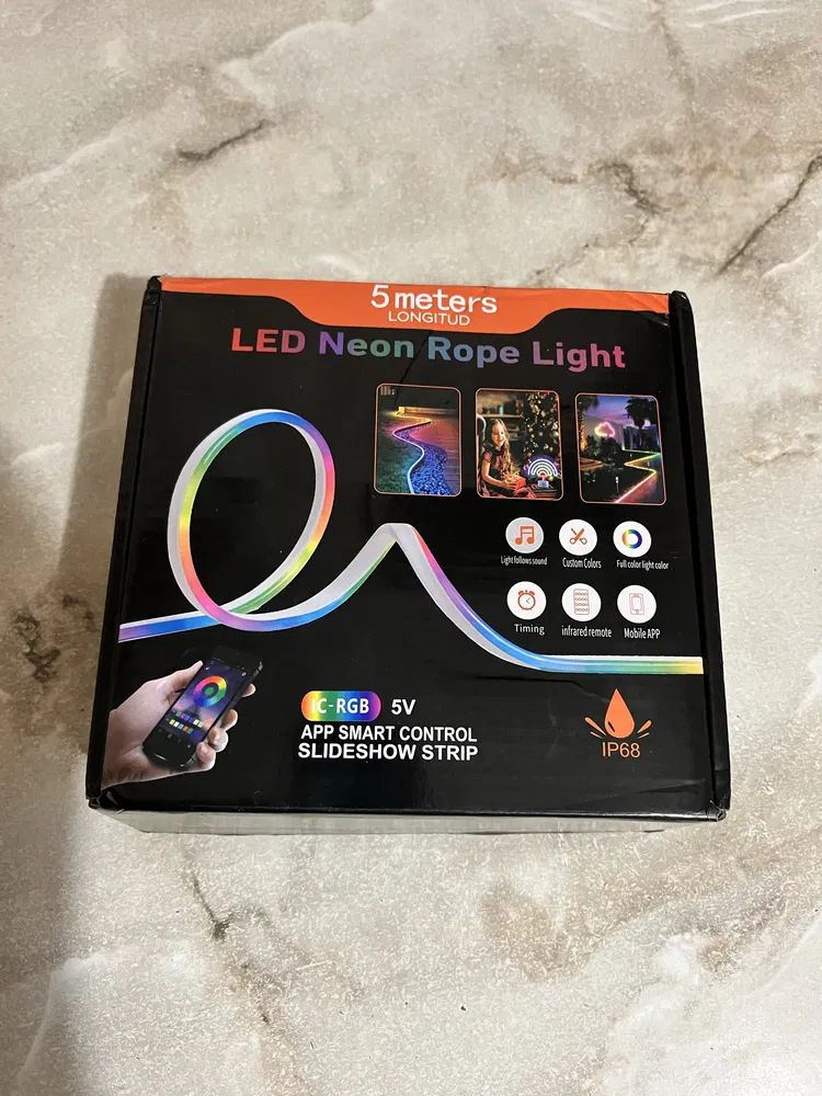 LED App Control Neon Rope Light – Smart 5M RGB Snake Light with Music Sync & Multiple Effects.A modern decorative lighting solution designed to transform bedrooms, gaming setups, living rooms, shops,