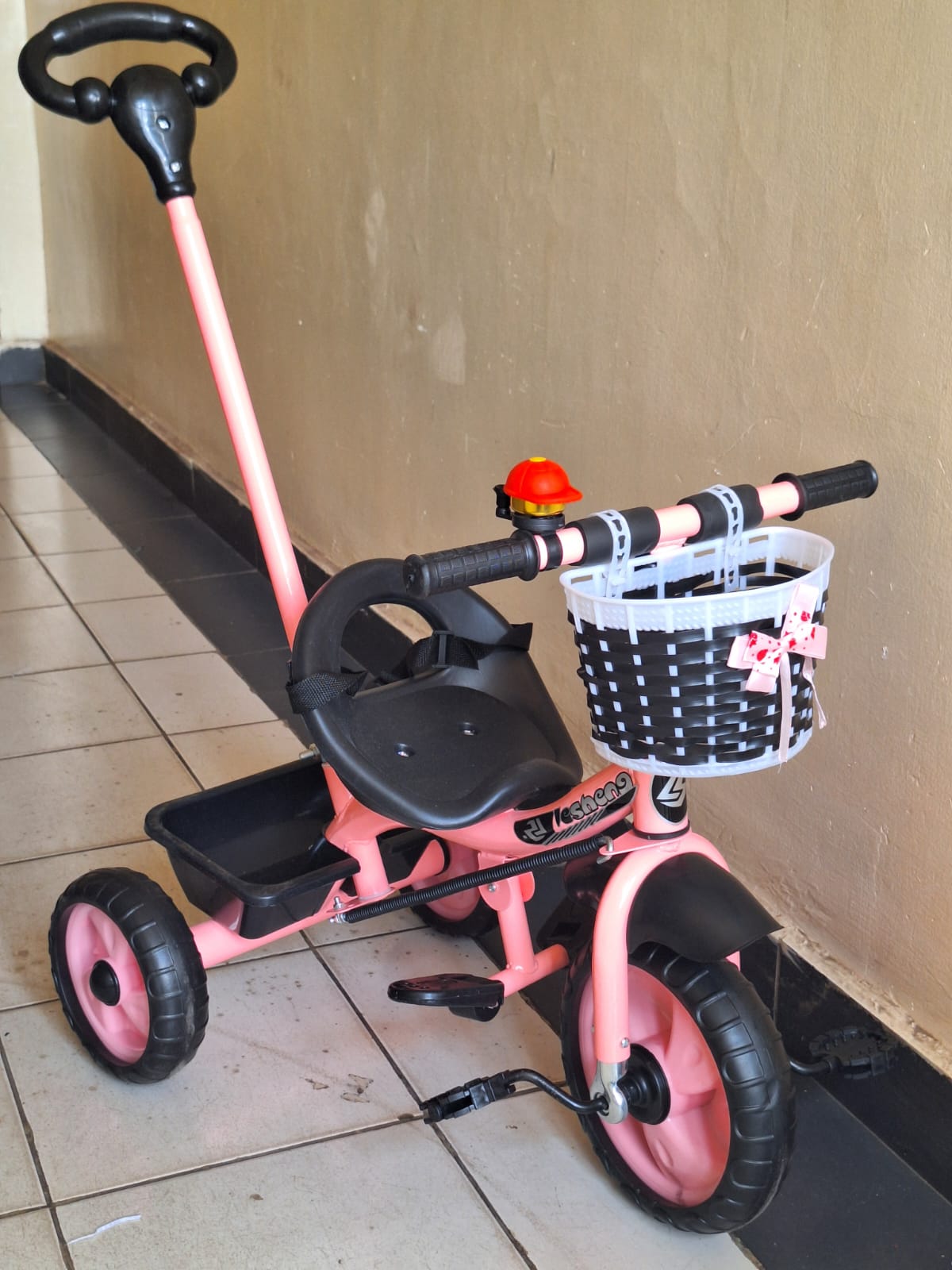 tricycle with push handle and basket