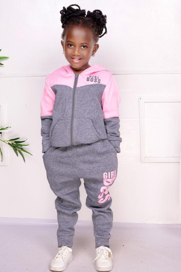 Kids Warm Unisex Track Set, also commonly referred to as a tracksuit, for children. 
This type of clothing typically includes: 
Hoodie/Jacket: A hooded top or jacket with a zipper closure, often made