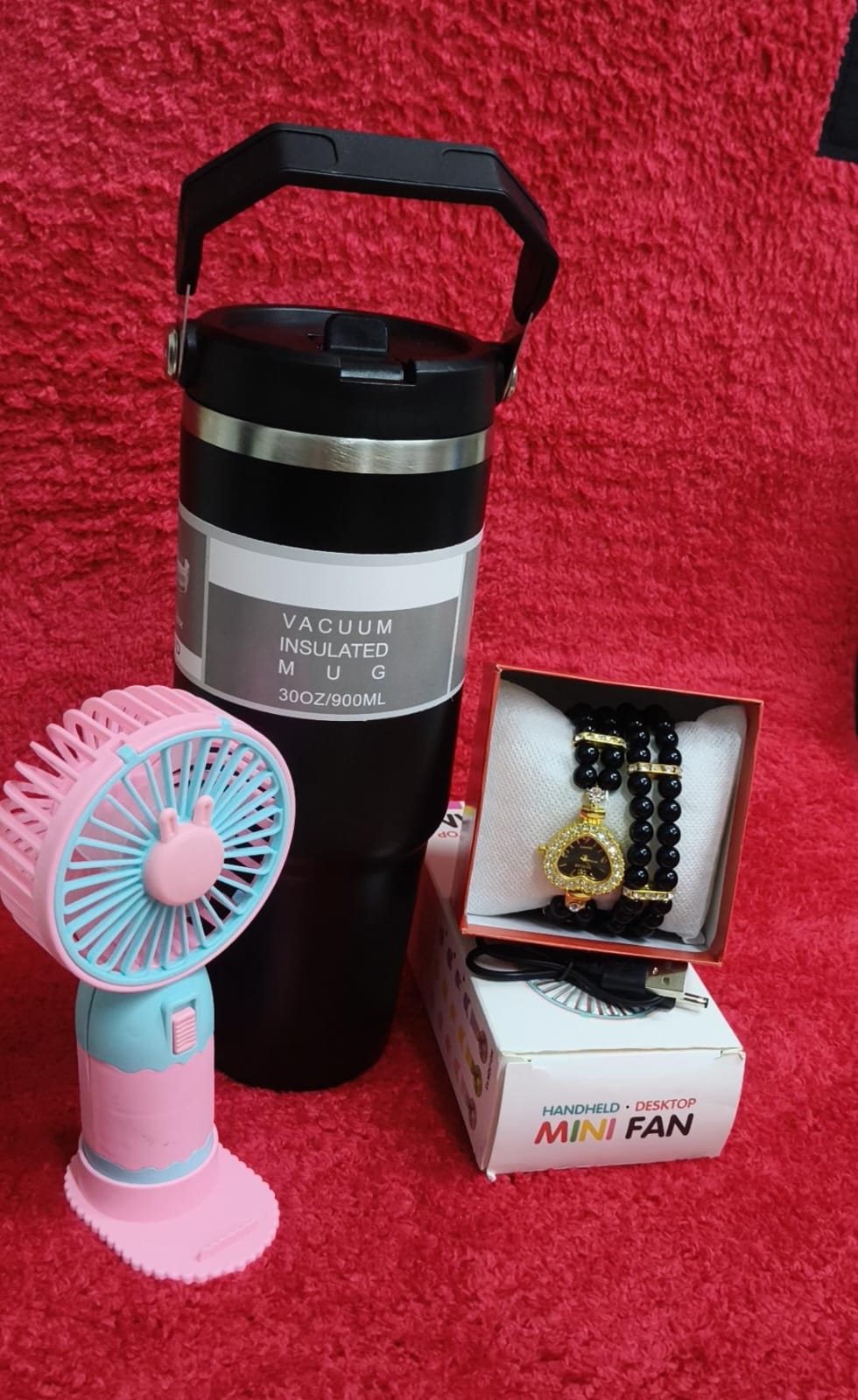 ♦️900 ml insulated mug(can keep hot or cold 
♦️ portable fan 
♦️ Watch+bracelet+gift box
♦️