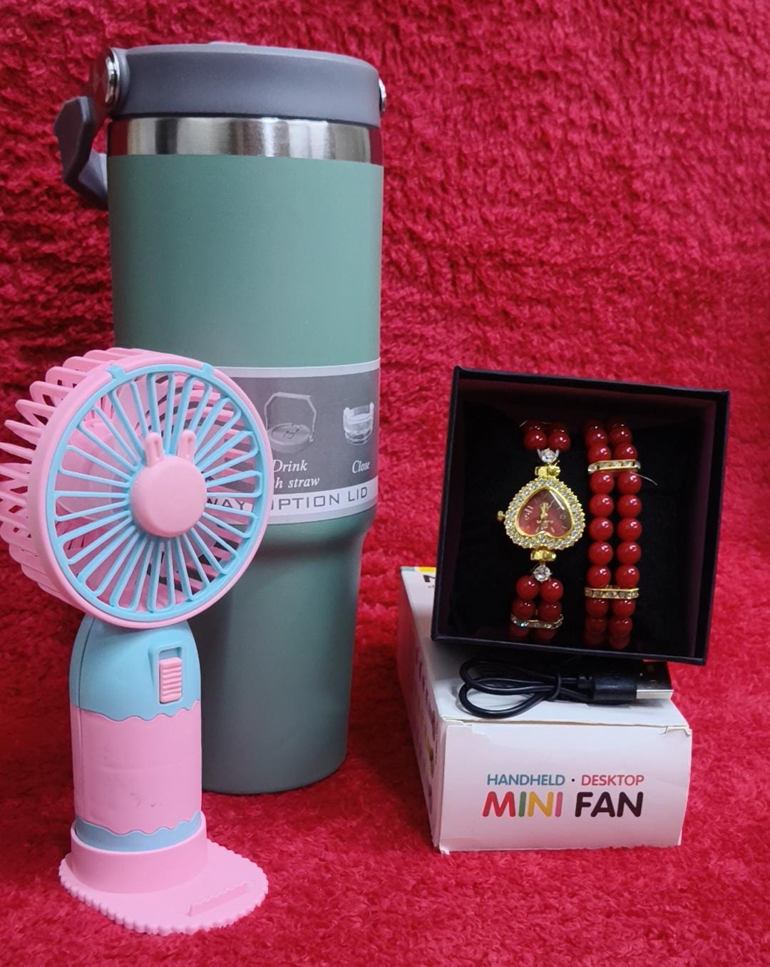 ♦️900 ml insulated mug(can keep hot or cold 
♦️ portable fan 
♦️ Watch+bracelet+gift box
♦️