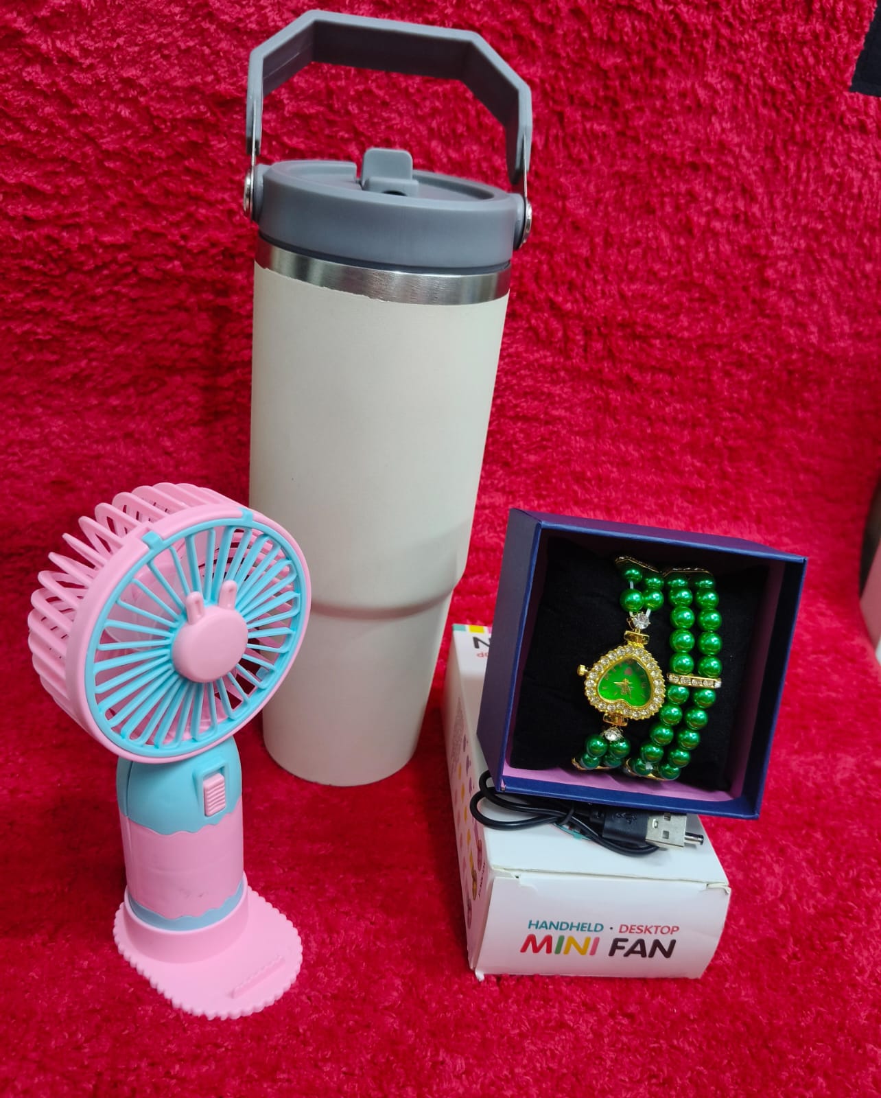 ♦️900 ml insulated mug(can keep hot or cold 
♦️ portable fan 
♦️ Watch+bracelet+gift box
♦️