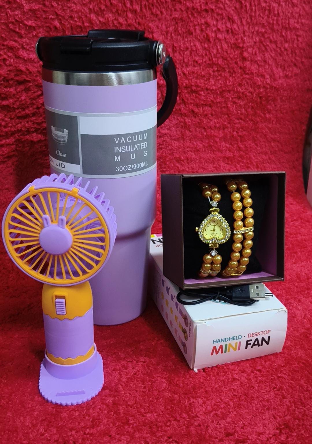 ♦️900 ml insulated mug(can keep hot or cold 
♦️ portable fan 
♦️ Watch+bracelet+gift box
♦️