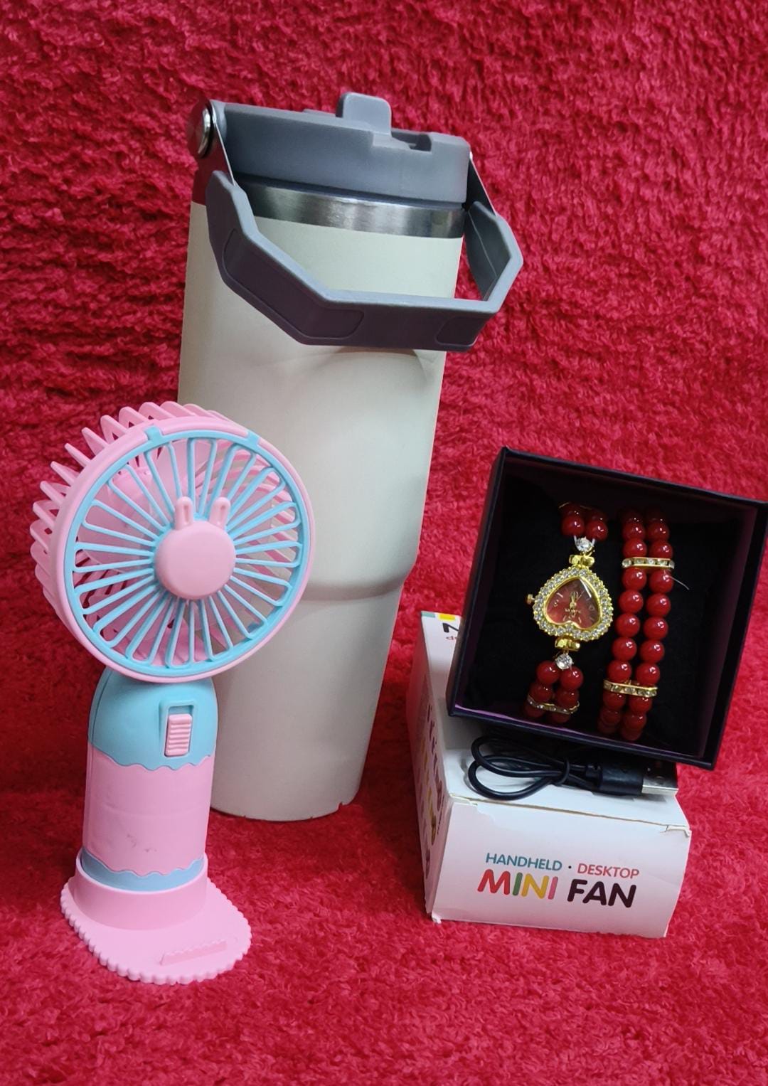 ♦️900 ml insulated mug(can keep hot or cold 
♦️ portable fan 
♦️ Watch+bracelet+gift box
♦️
