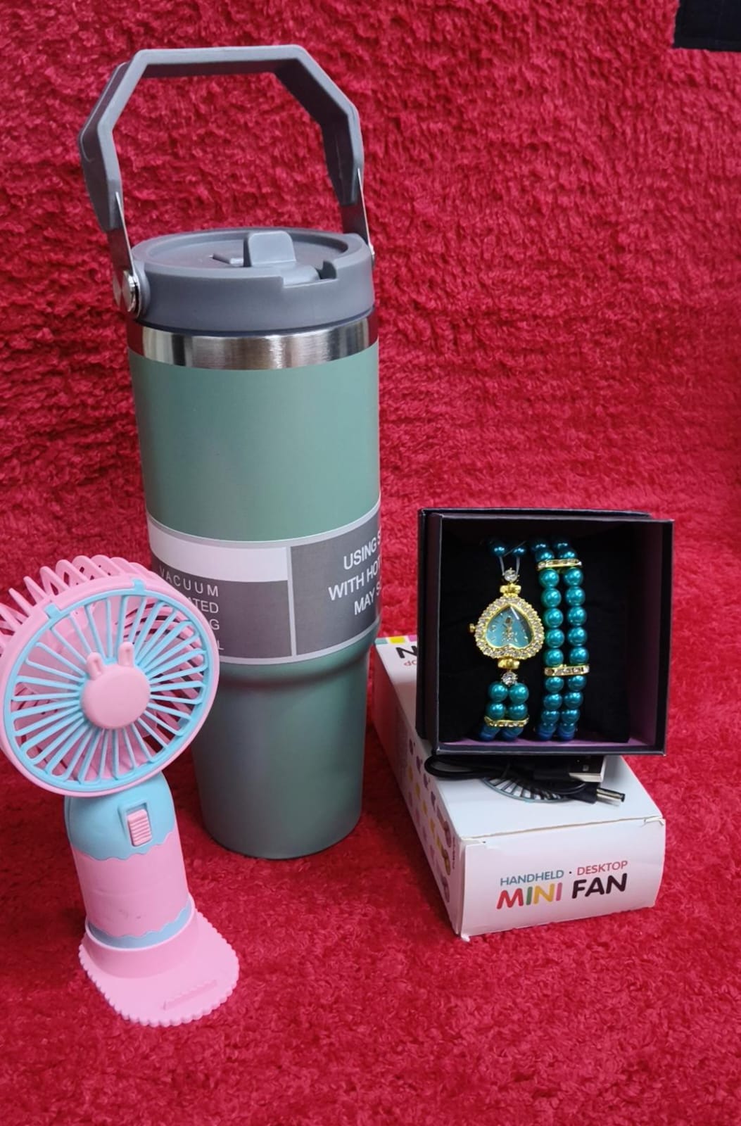 ♦️900 ml insulated mug(can keep hot or cold 
♦️ portable fan 
♦️ Watch+bracelet+gift box
♦️