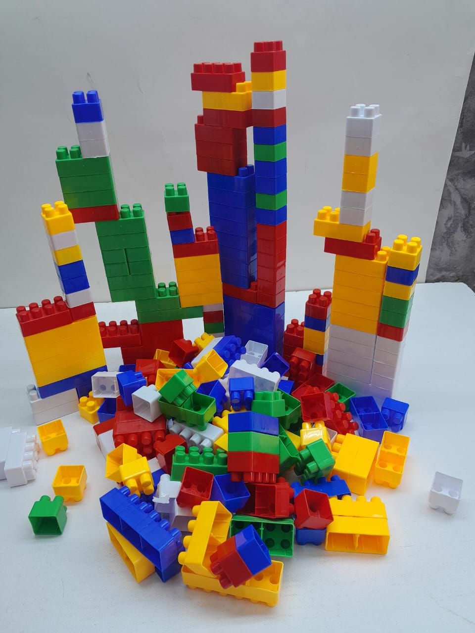 BLOCKS. Kids blocks 130 pieces,  it is non-toxic, brittle safe, long-lasting and more resilient. It will not break easily. Because of its vivid, bright colors, this toy is ideal as a kid's toy.