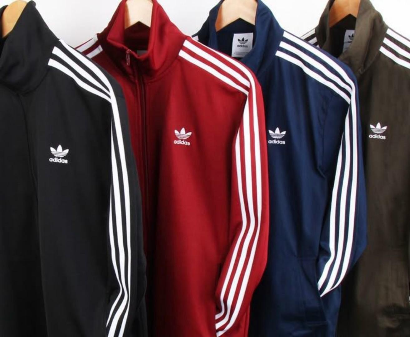 ORIGINAL MAROON ADIDAS TRACKSUIT, MAROON AND WHITE STRIPES. UNISEX, HIGH QUALITY COTTON MATERIAL. WOMEN TRACKSUITS, MEN TRACKSUITS, KIDS TRACKSUITS. SPORTS TRACKSUITS