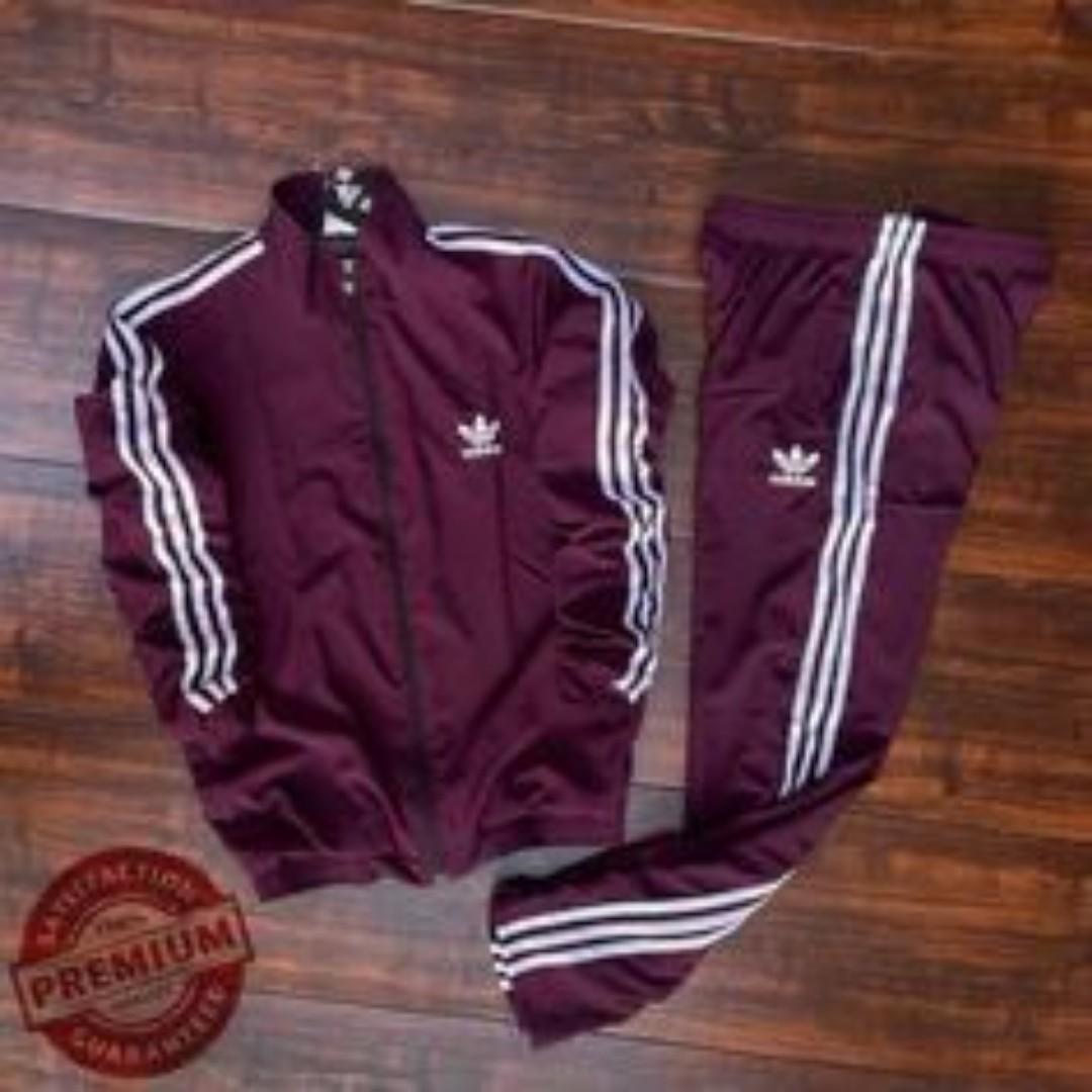 ORIGINAL MAROON ADIDAS TRACKSUIT, MAROON AND WHITE STRIPES. UNISEX, HIGH QUALITY COTTON MATERIAL. WOMEN TRACKSUITS, MEN TRACKSUITS, KIDS TRACKSUITS. SPORTS TRACKSUITS