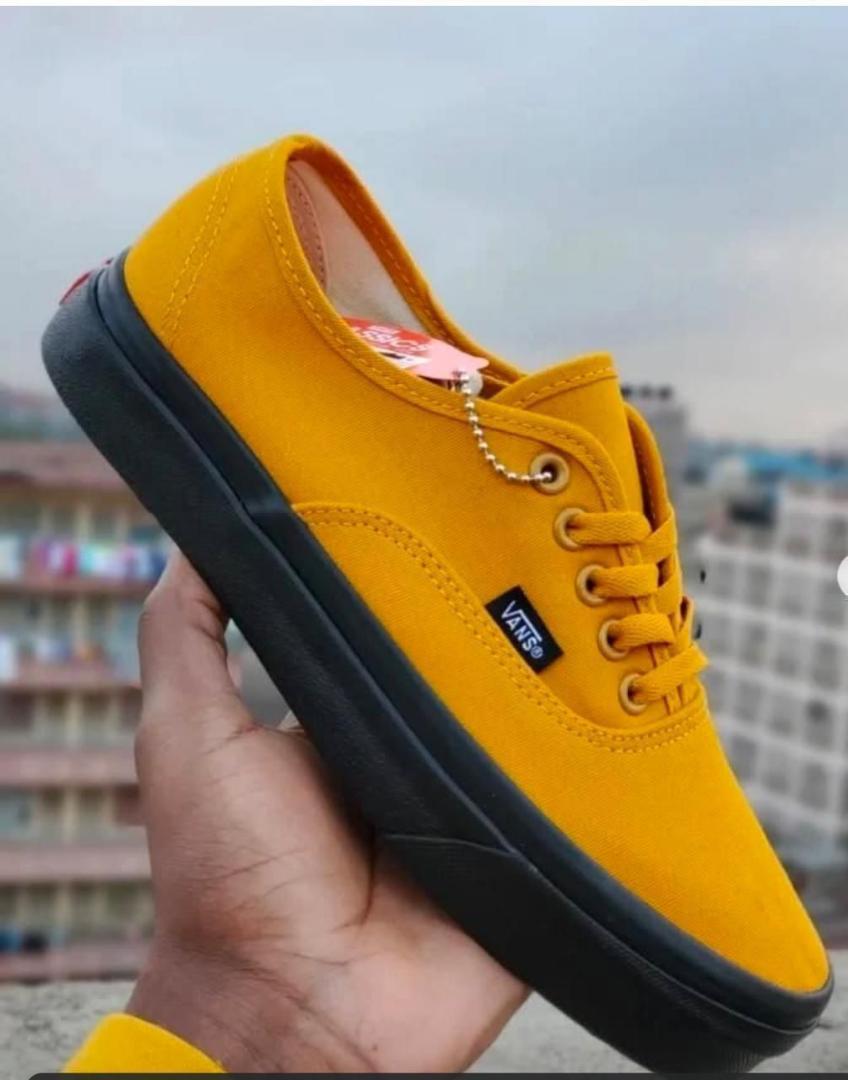NEW ARRIVAL VANS OF THE WALL, YELLOW VANS, CASUAL RUBBERS, LACE UP, VERY COMFORTABLE AND DURABLE RUBBER SHOES. BEST SHOP FOR VANS, MENS RUBBERS, WOMEN RUBBERS