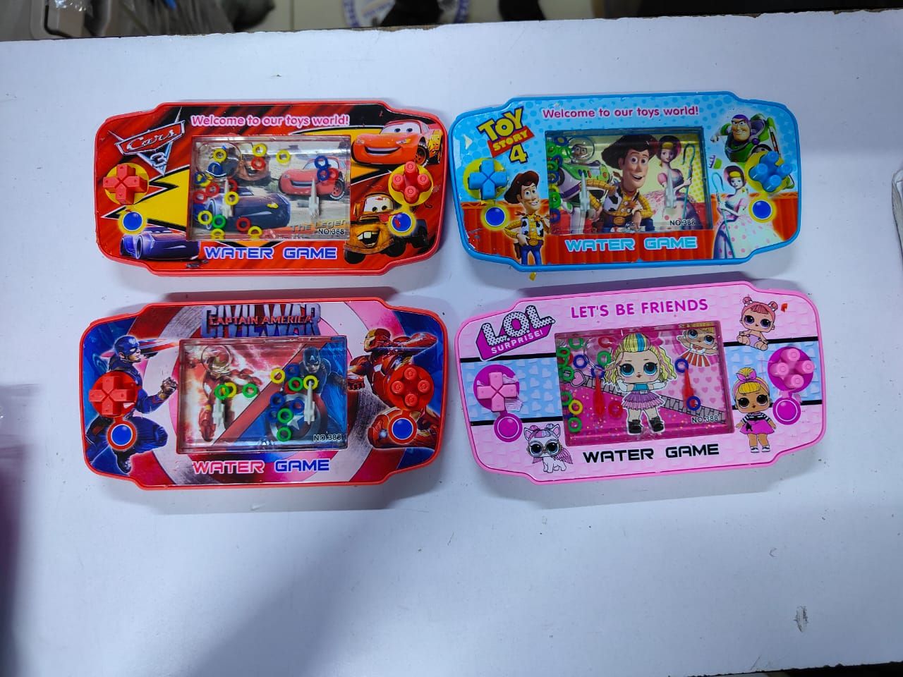 😇💫Cartoon Yellow Duck/Long/Crescent Small Game Machine Water Loop Game Machine Mini Handheld Nostalgic Children's Toy Random Color