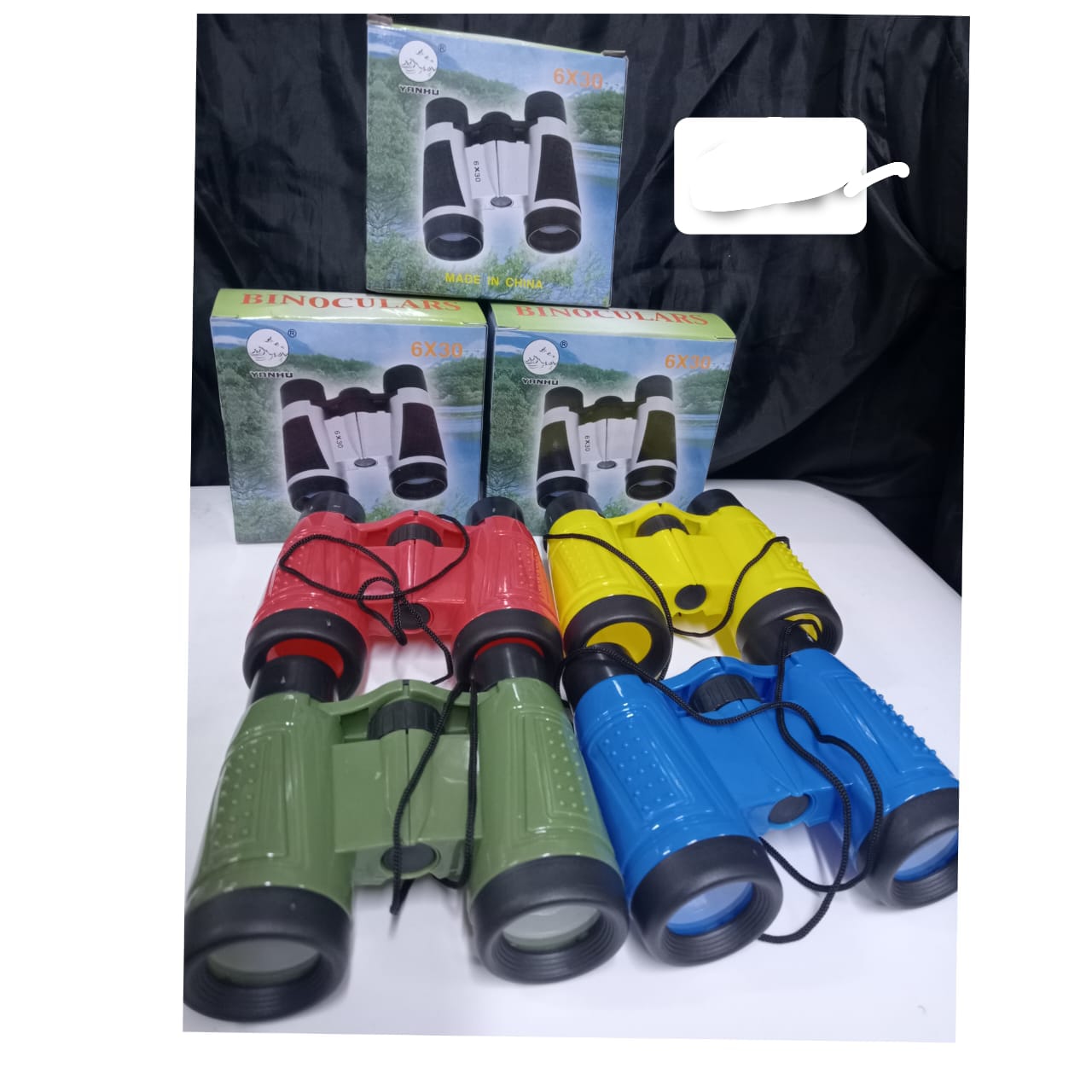 2pairs toy binoculars for children. e in assorted vibrant colors like red, green, yellow, and blue.
Feature 6x magnification and 30mm objective lenses.
Made from lightweight, durable plastic, s