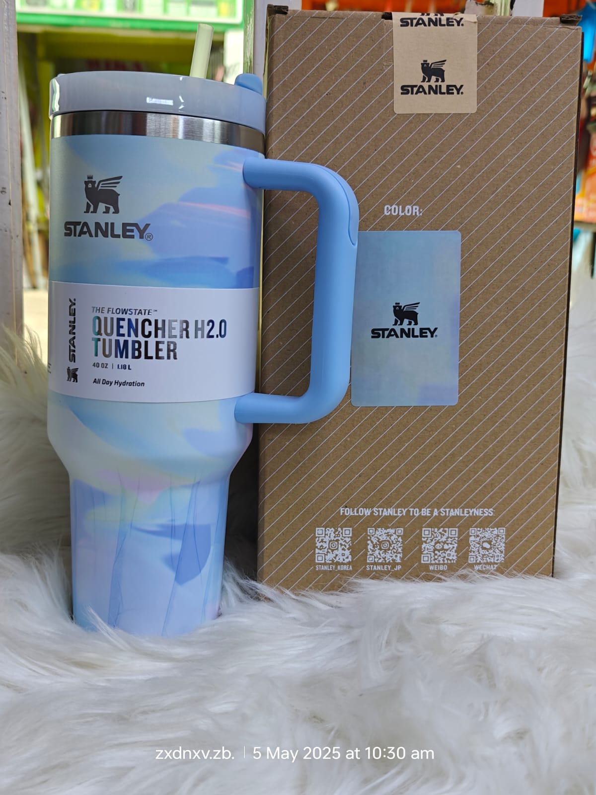 Stanley Quencher H2.0 FlowState Stainless Steel Vacuum Insulated Tumbler with Lid and Straw for Water, Iced Tea or Coffee, Smoothie and More, baby blue marble 2.0, 40oz