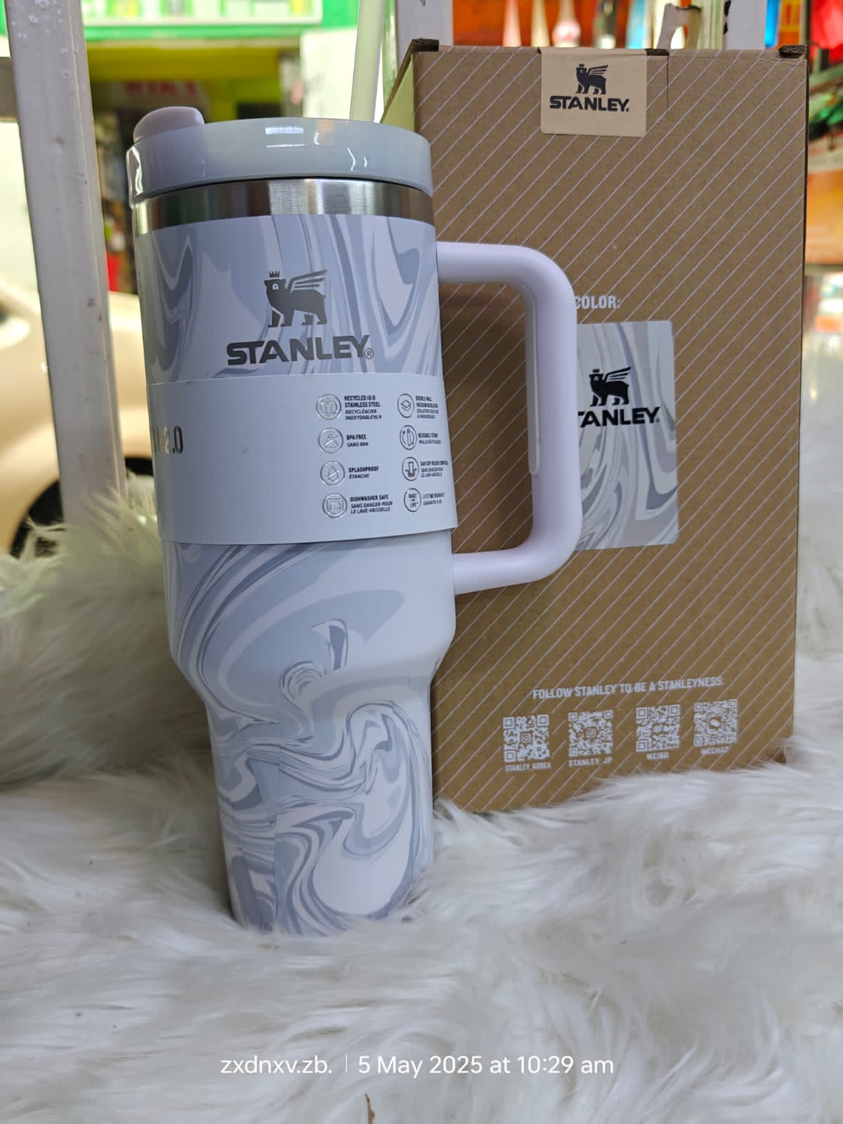 Stanley Quencher H2.0 FlowState Stainless Steel Vacuum Insulated Tumbler with Lid and Straw for Water, Iced Tea or Coffee, Smoothie and More, baby blue marble 2.0, 40oz