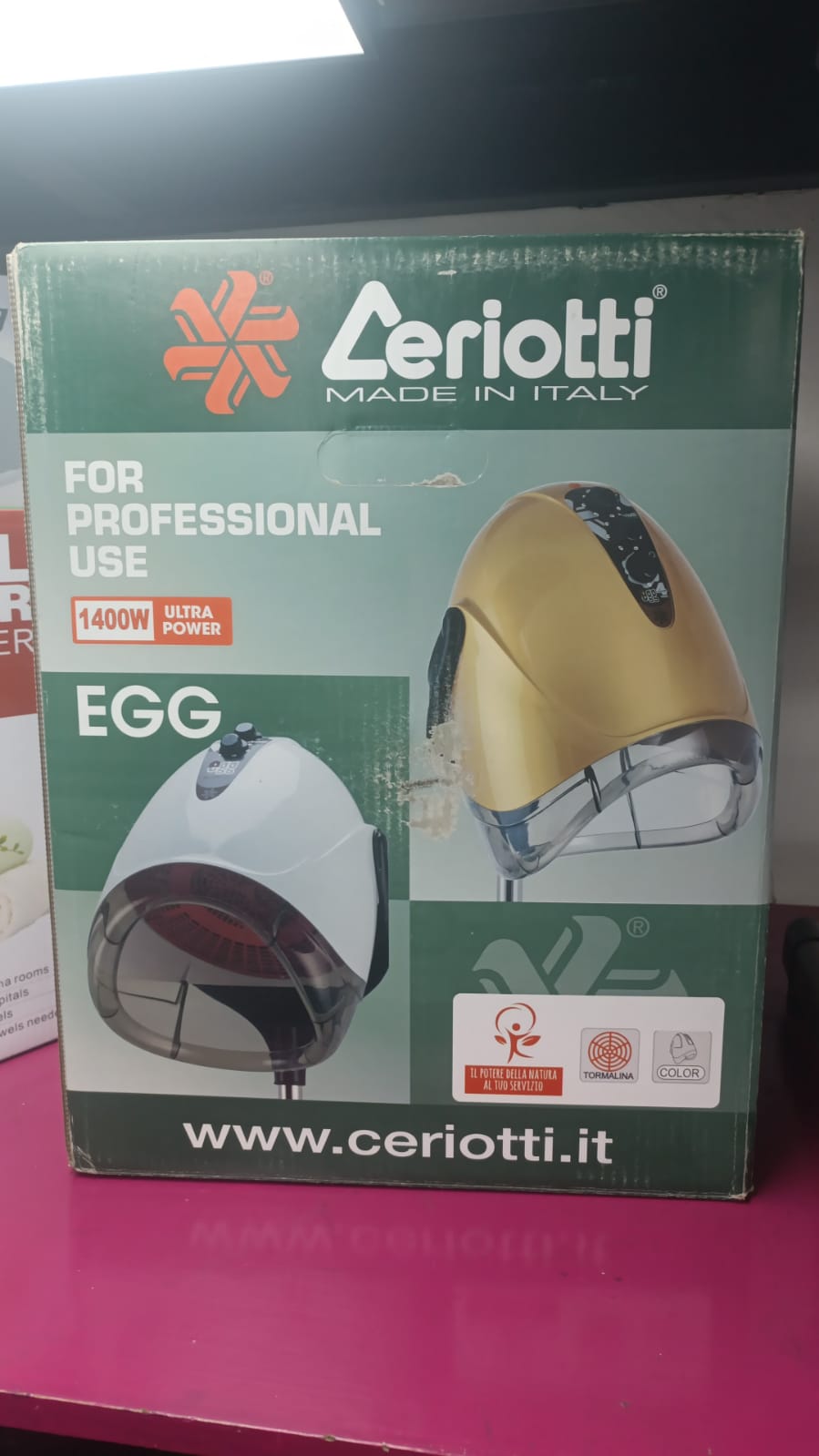 Ceriotti EGG professional hood hairdryer.
This is a hood-style hair dryer designed for use in professional salons. Key features of the product include: 
Design: It has a compact, egg-shaped design wit
