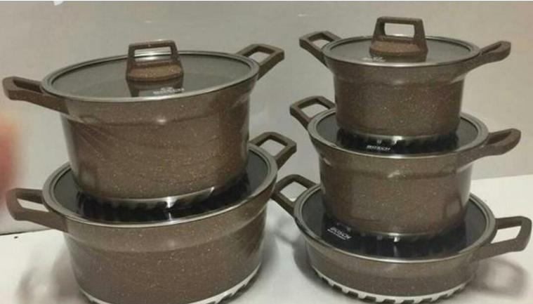 11 pieces  quality Bosch non-stick cook ware set and a free mwiko with WARRANTY