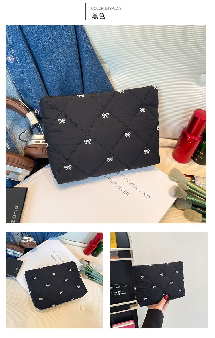 Butterfly knot pattern is fashionable and versatile. Quilted embroidery thread grid filled cotton makeup bag, casual hand-held bag, warm down small bag, inner bag, wash bag, pen bag, travel bag