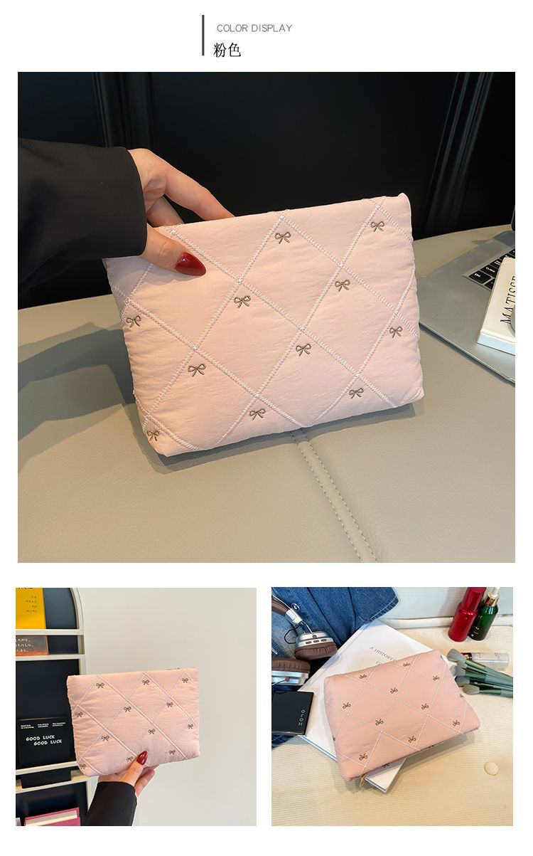 Butterfly knot pattern is fashionable and versatile. Quilted embroidery thread grid filled cotton makeup bag, casual hand-held bag, warm down small bag, inner bag, wash bag, pen bag, travel bag