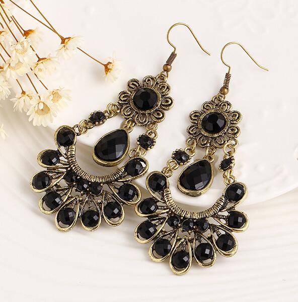 European and American foreign trade Bohemian retro exaggerated earrings long carved hollowed fringe water drop green earrings