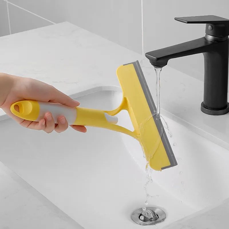 Multi-functional 3 in 1 short-handled window cleaning tool Cleans mirrors with dual-sided brushing and scraping action Includes built-in spray bottle cleaning solution