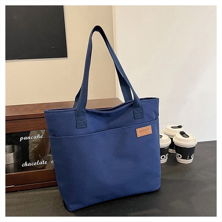 Student Canvas Tote Bag for School Simple Large Capacity Shoulder Bag Versatile Commuting Handbag Literary Style Casual Tote Reusable Handheld Cloth Shopping Bag for Women