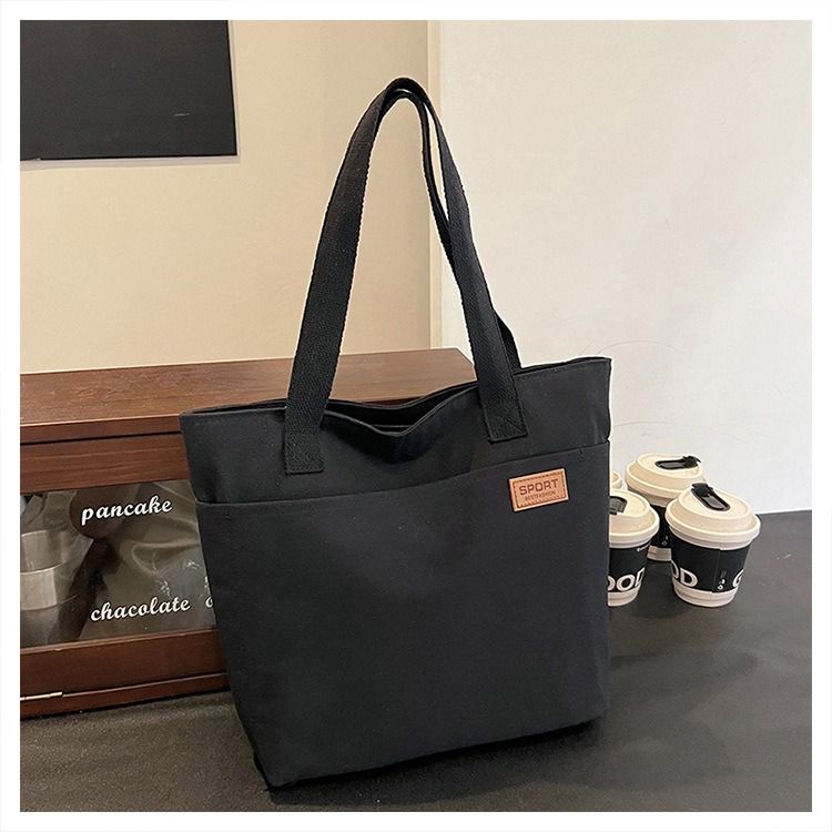 Student Canvas Tote Bag for School Simple Large Capacity Shoulder Bag Versatile Commuting Handbag Literary Style Casual Tote Reusable Handheld Cloth Shopping Bag for Women