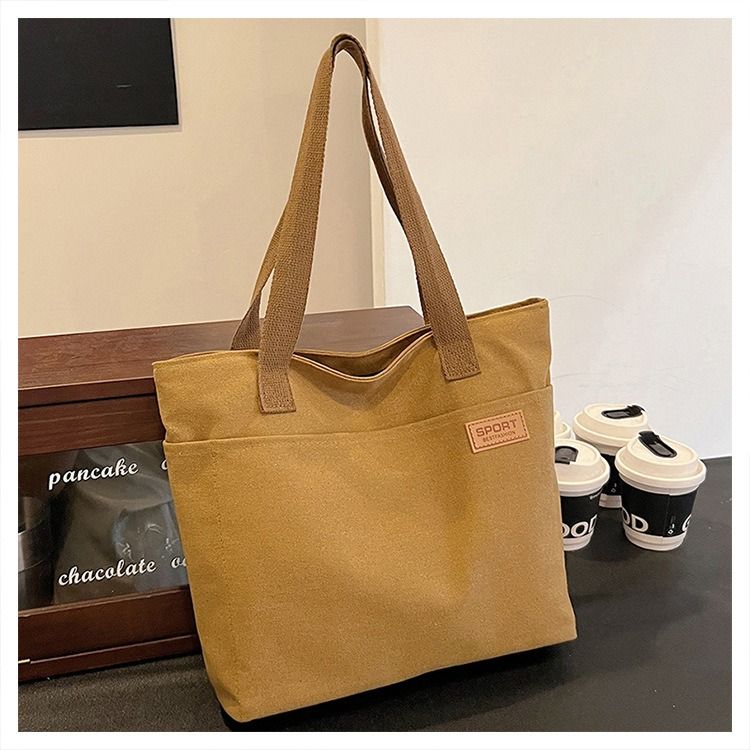 Student Canvas Tote Bag for School Simple Large Capacity Shoulder Bag Versatile Commuting Handbag Literary Style Casual Tote Reusable Handheld Cloth Shopping Bag for Women