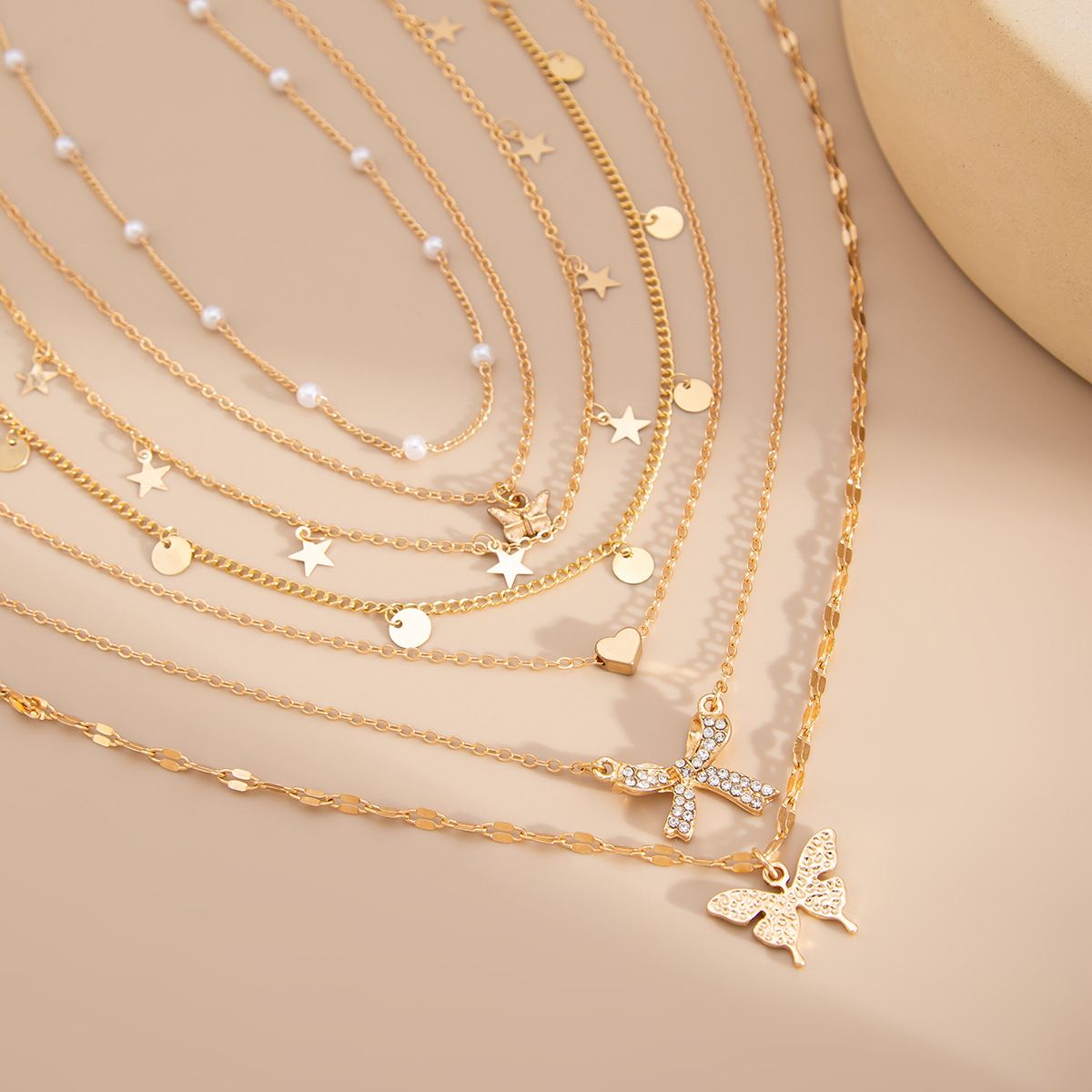 7-Layer Layered Necklace Set for Women Butterfly & Bow Alloy Pendants with Star, Heart and Faux Pearl Fashion Collarbone Jewelry