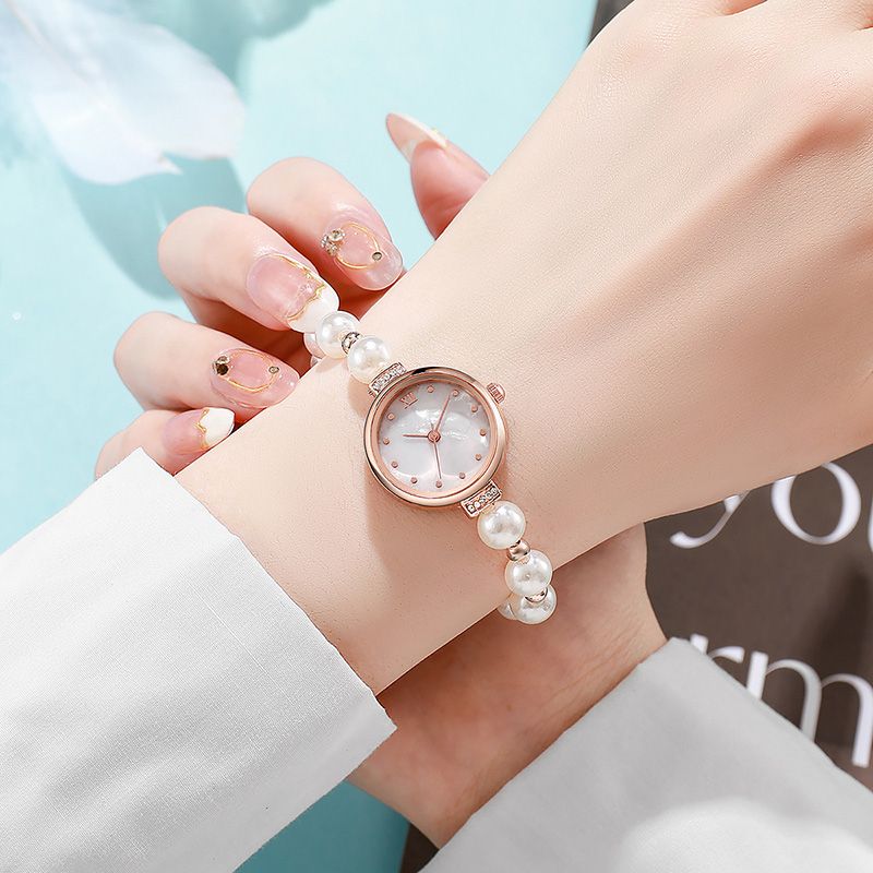 New Fashionable Pearl Strap Beimu Round Women's Watch Free Adjustable Bracelet Watch For Women Quartz Watch Personalized Temperament Bracelet Watch Golden White